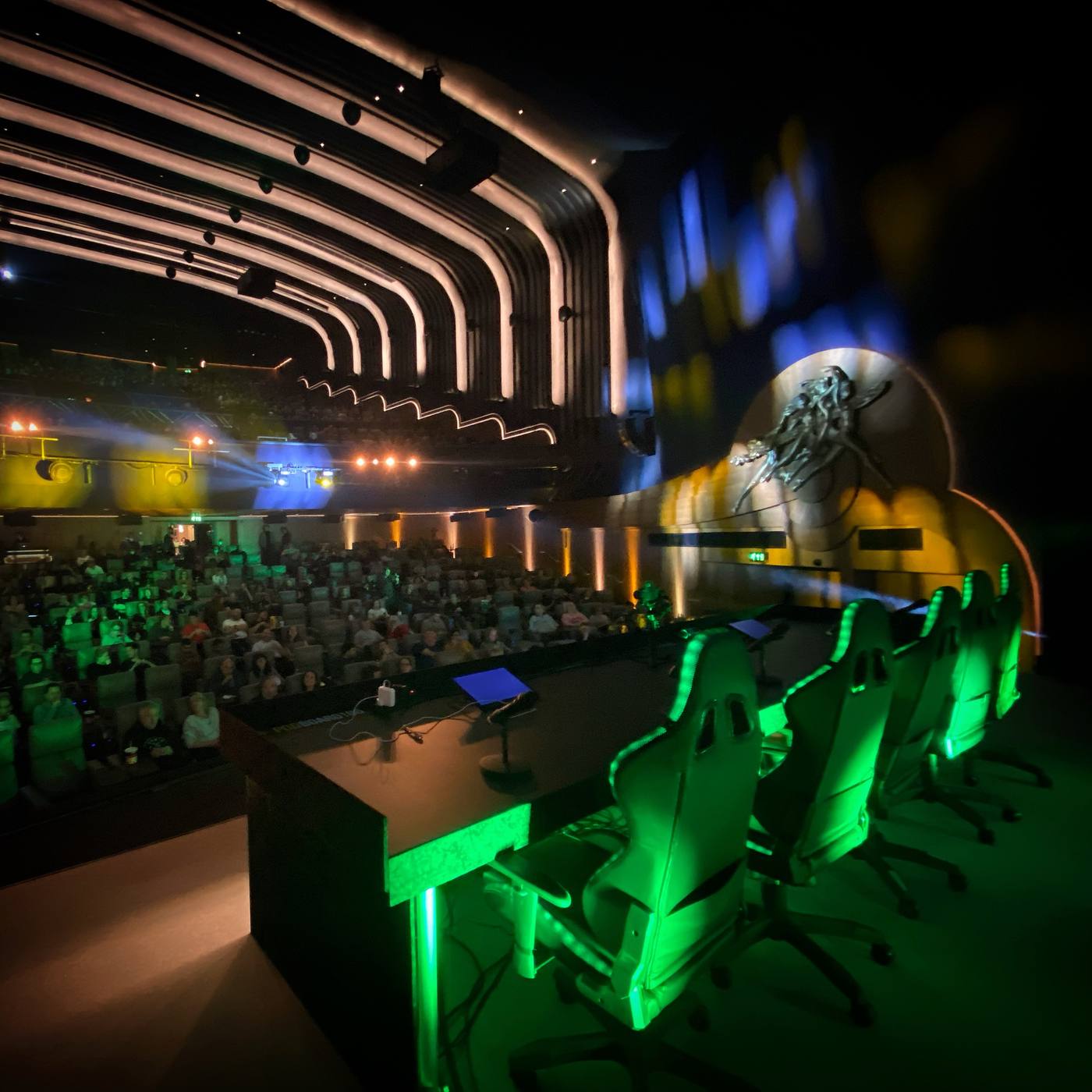 Live event stage and audience at a podcast conference